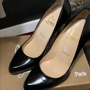 Pre owned red bottoms (one heel has a small mark)